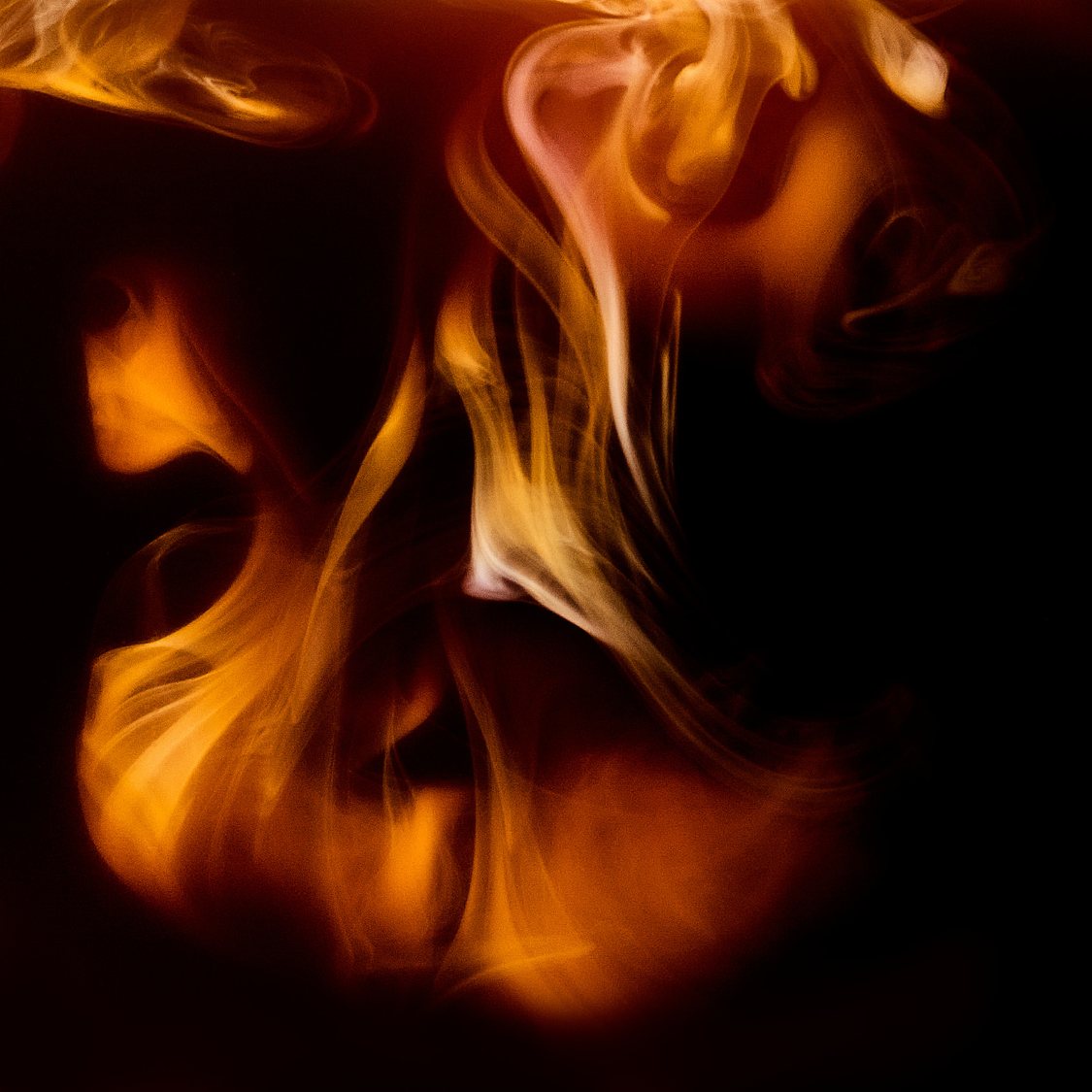 Coffee with milk flames close up