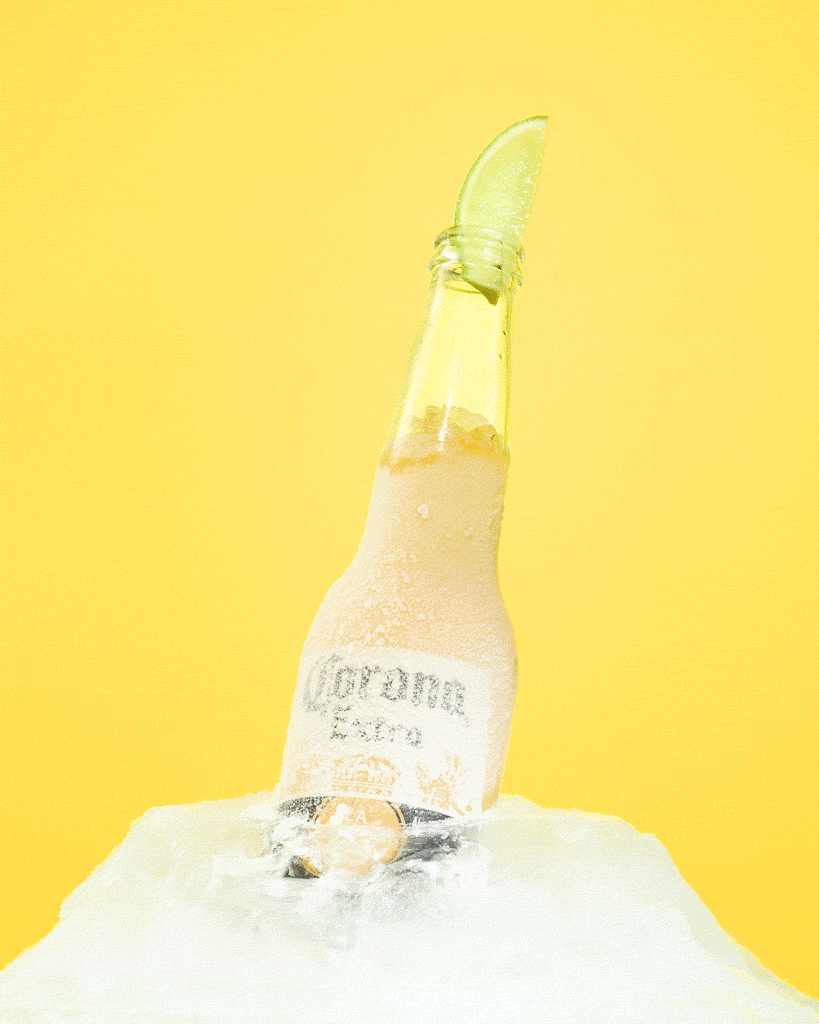 Corona beer bottle in ice block melting timelapse