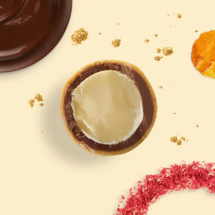 Cut brown Macolat with ingredients