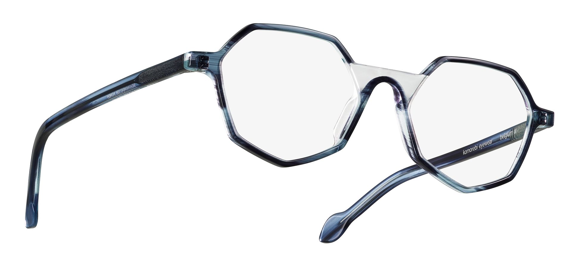 Komorebi Lionel eyeglasses in Patagonia blue, hexagonal frame, three quarter view on white, Studio Ballena